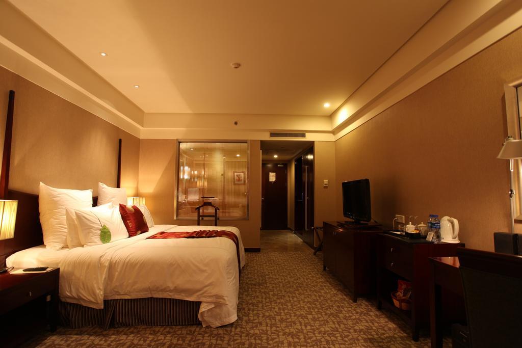 Ruiwan New Century Hotel Tianjin Habitación foto